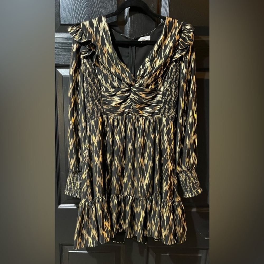 A Loves A Metallic Gold And Black Party Dress